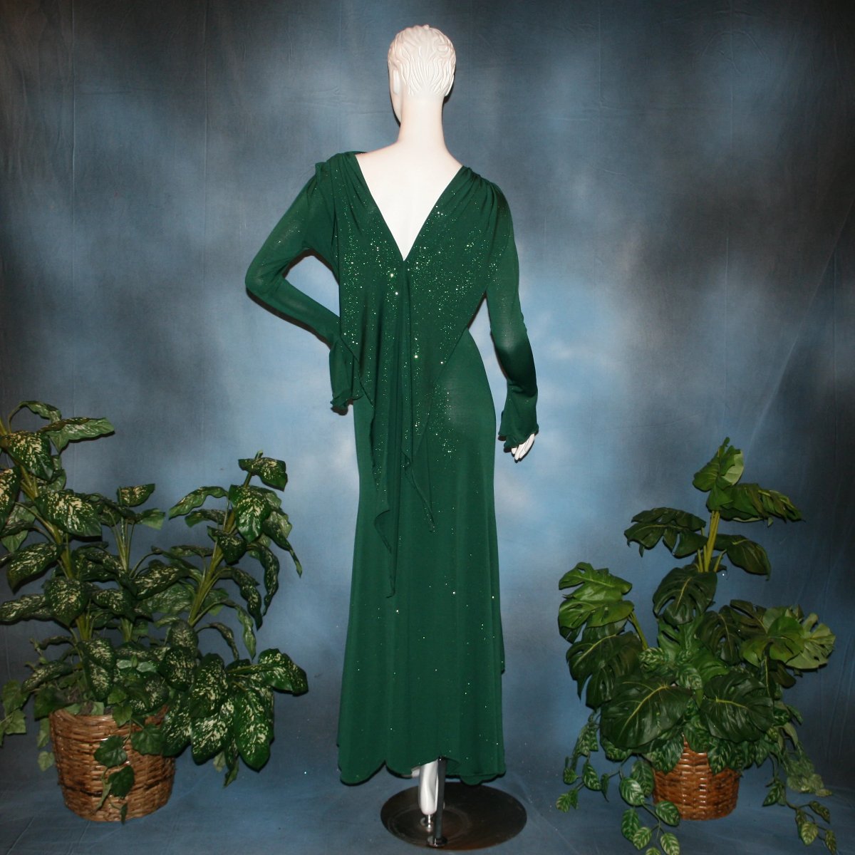Crystal's Creations back view of Green social ballroom dress was created in luxurious deep emerald glitter slinky, with full  & flaring skirt bottom, long flair sleeves & draping trailing down the back makes this gorgeous dress very elegant & classy!