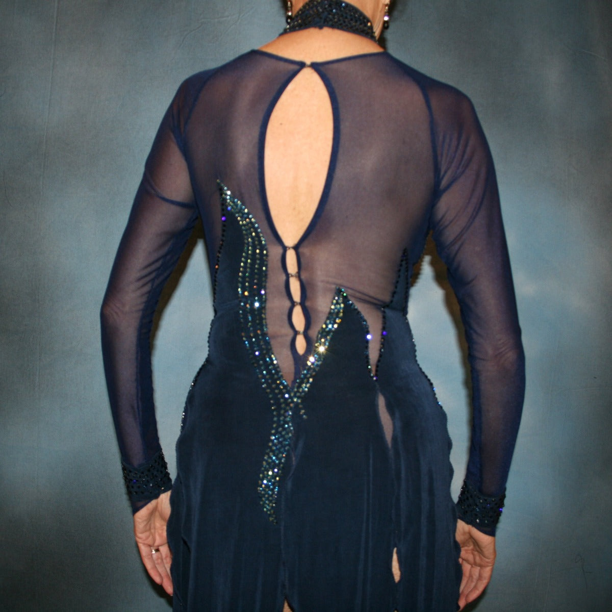 Crystal's creations close up back view of Navy blue Latin/rhythm dress was created in luxurious navy solid slinky & sheer mesh… embellished with montana(navy) & montana AB Swarovski rhinestone work. 