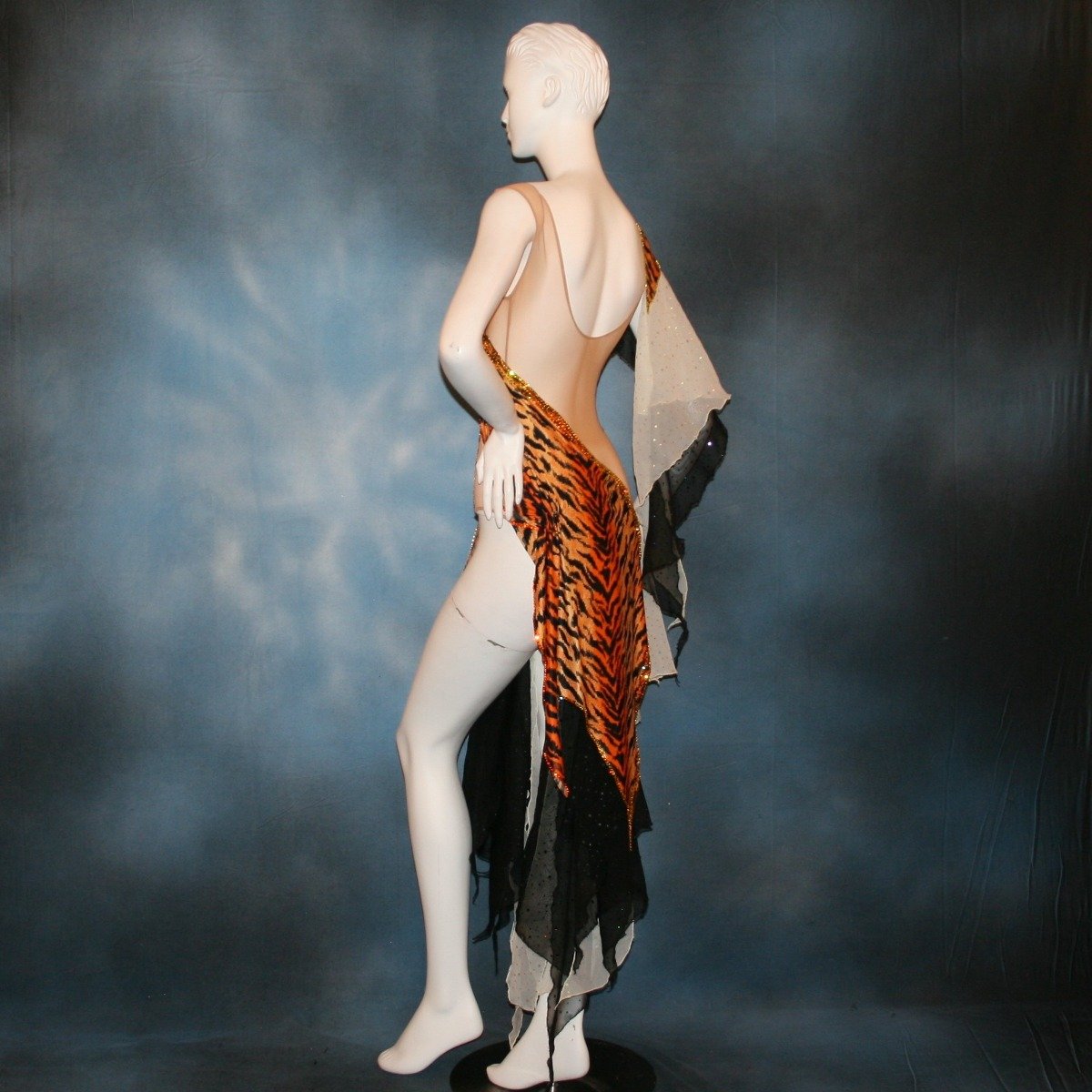 Crystal's Creations left side view of tiger print Latin/rhythm dress with pale yellow accents
