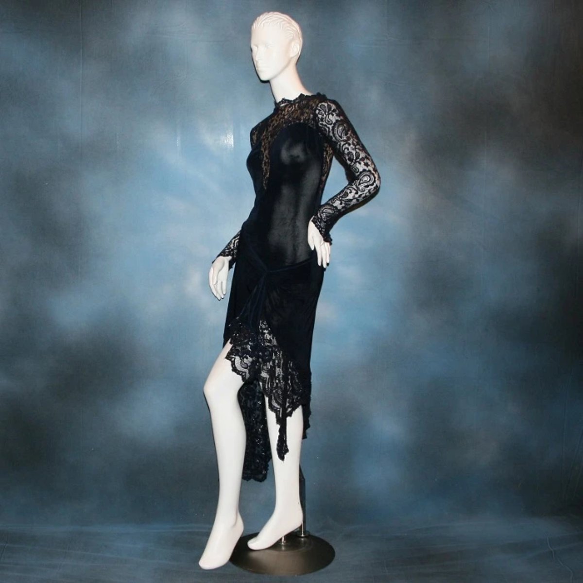 left side view of Navy blue bodysuit & matching Latin/rhythm sarong style skirt of luxurious navy slinky & stretch navy lace with a touch of perwinkle metallic through out, makes a fabulous social Latin dress , beginner show Latin/rhythm dress or tango dress.