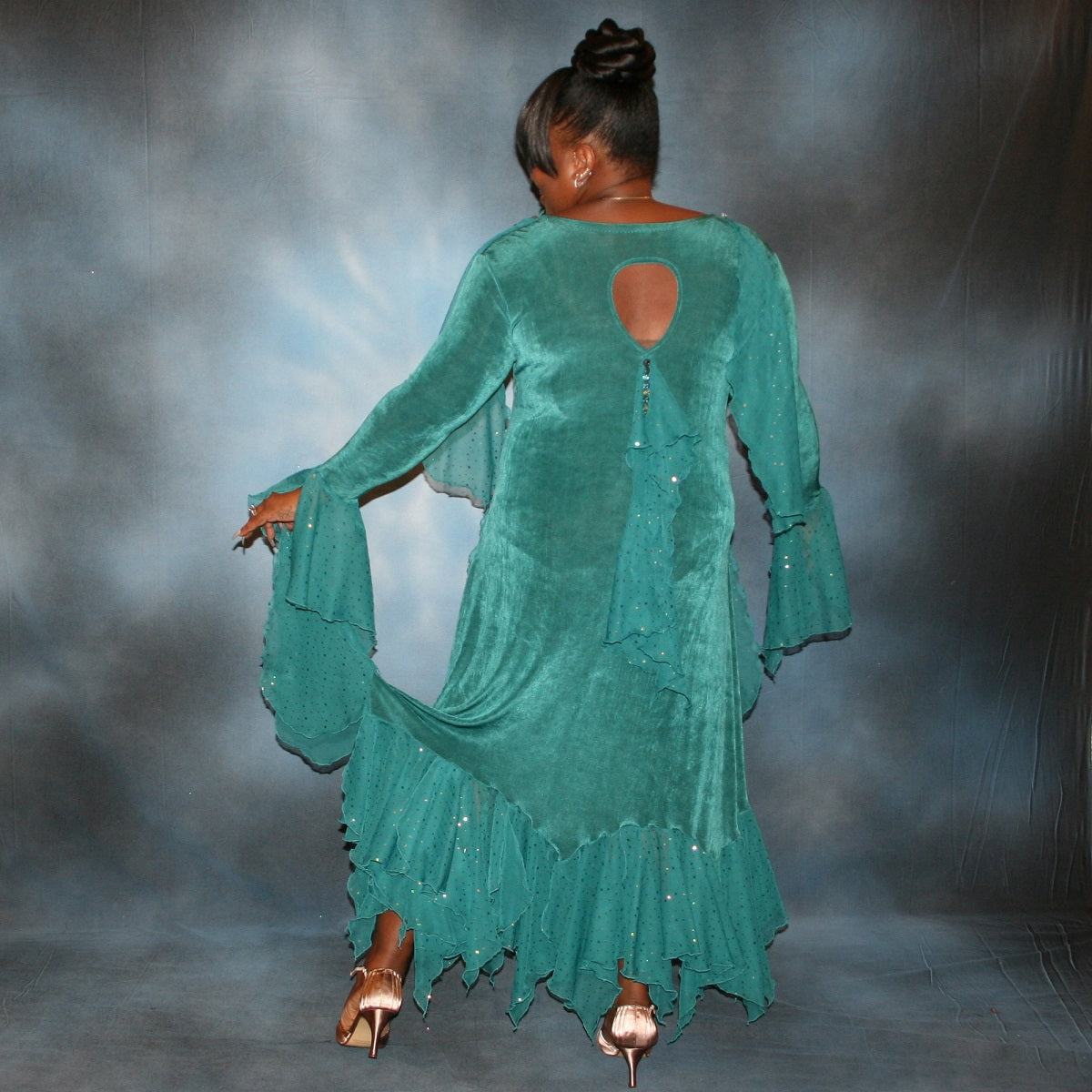 back view of Teal plus size ballroom dance dress was created in luxurious teal solid slinky with oodles of champagne sequined chiffon flounces & floats, embellished with a lovely touch of Swarovski hand beading.