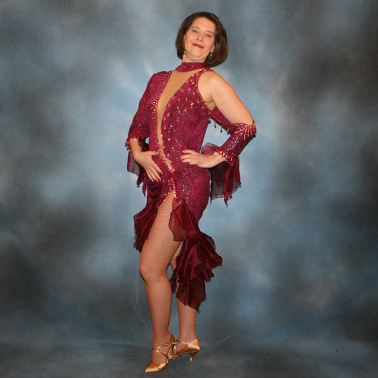 Crystal's Creations Burgundy Latin/rhythm dress created of burgundy glitter slinky with flounces of burgundy organza, embellished with light rose Ab Swarovski rhinestone work along with light rose extensive Swarovski hand beading