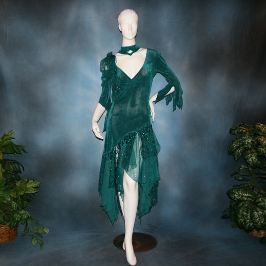 Crystal's Creations Teal blue social Latin/rhythm dress created in luxurious teal solid slinky, with tails & flounces of stretch lace & champagne sequined chiffon, embellished with hand beading of blue zircon faceted rounds & tear drops, includes a neck piece & arm embellishment adorned with zircon Swarovski rhinestones.