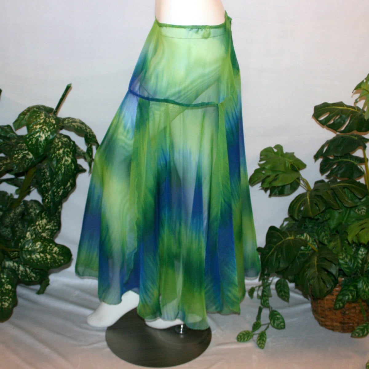 side view of Blue & green ballroom skirt created in yards of a gorgeous blue & green variegated chiffon, flows beautifully for your waltzes & foxtrots.