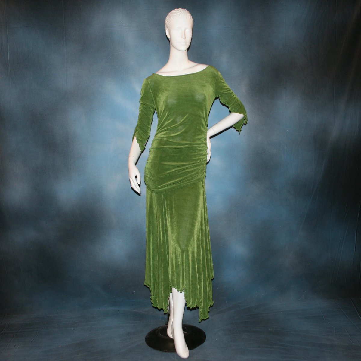 Ruched top with ruched 3/4 sleeves with a slight flaired detail includes trumpet flaired ballroom dance skirt with peaks created of luxurious olive green solid slinky fabric, & can be custom created in many colors. Great for ballroom dance teachers!