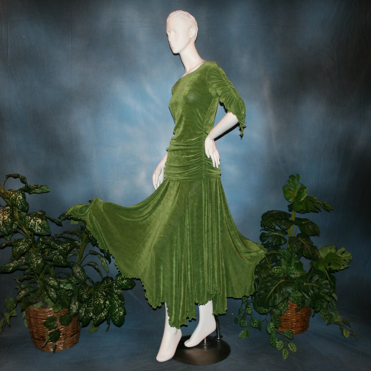side view of Ruched top with ruched 3/4 sleeves with a slight flaired detail includes trumpet flaired ballroom dance skirt with peaks created of luxurious olive green solid slinky fabric, & can be custom created in many colors. Great for ballroom dance teachers!