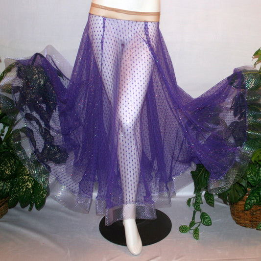 flaired view of Purple ballroom skirt created of yards of textured purple iridescent glitter sheer fabric with 4" iridescent horsehair hem. 