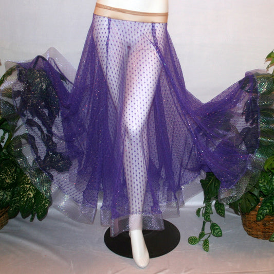 flaired view of Purple ballroom skirt created of yards of textured purple iridescent glitter sheer fabric with 4" iridescent horsehair hem.