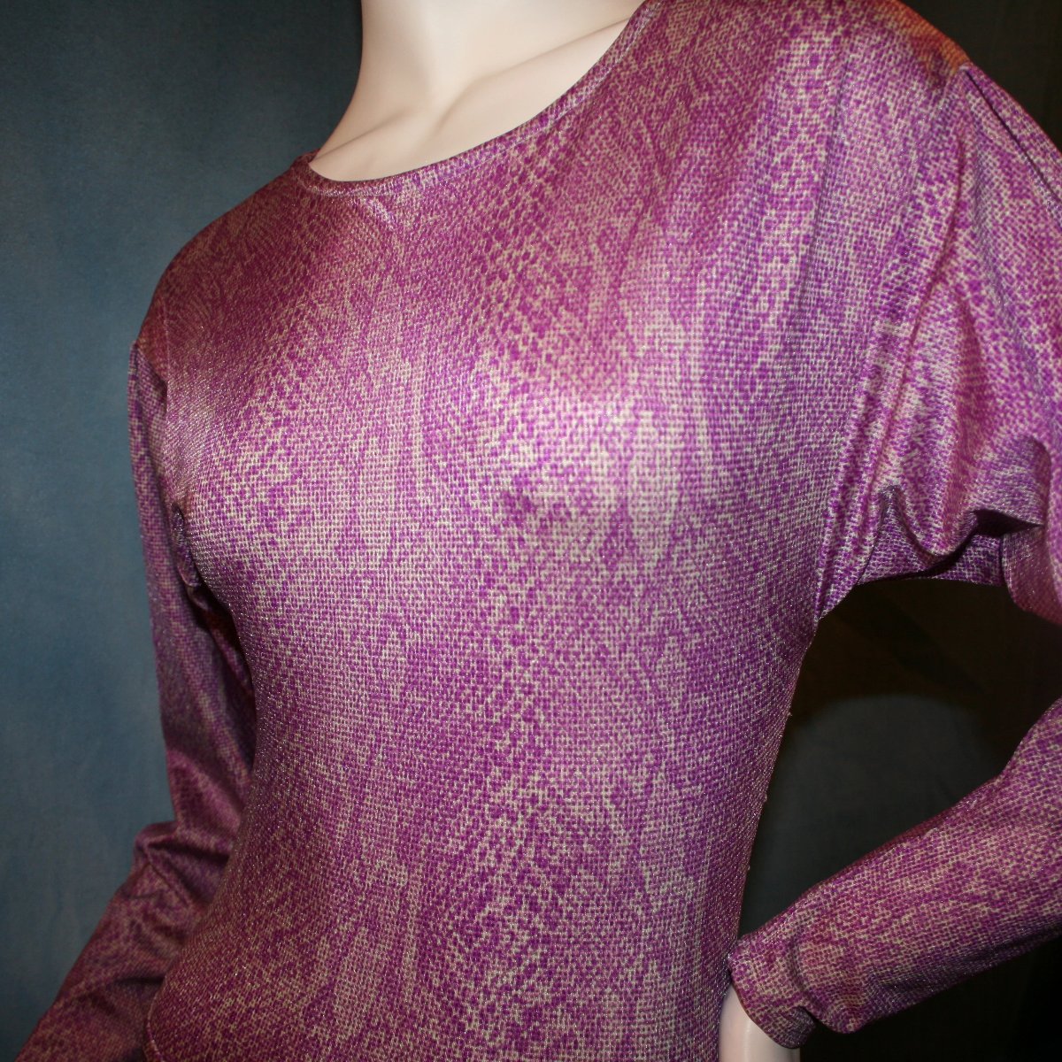 close up front view of Purple bodysuit with ruffled Latin/rhythm skirt of reptilia purple print lycra, with a slight iridescent sheen, great for any ballroom dance, ballroom teachers or practice.