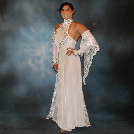 Crystal's Creations White ballroom dance dress was created in luxurious white stretch velvet with sequined lace insets & arm float, embellished with green peridot Swarovski detailed rhinestone work & miniature silk roses