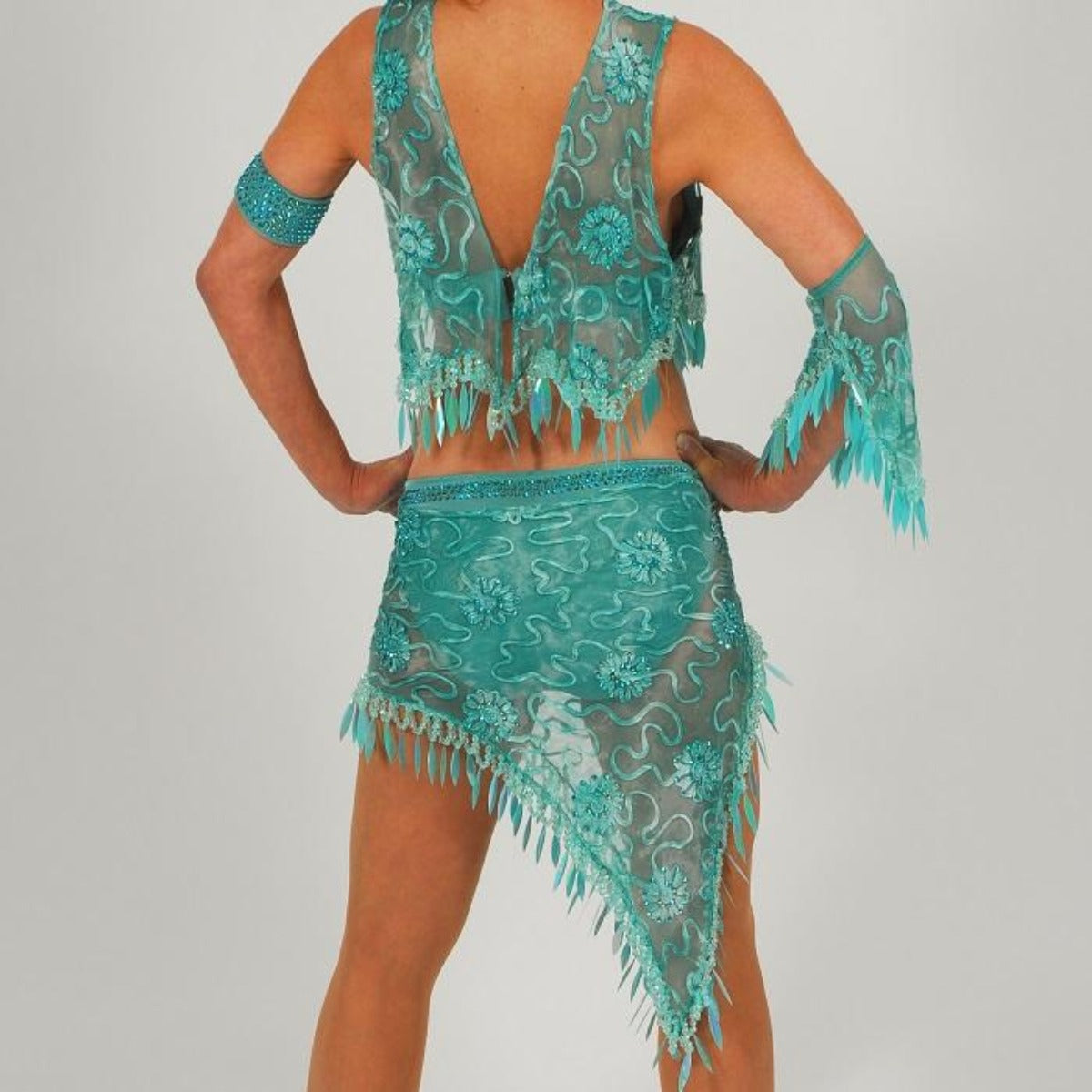 Crystal's Creations close back view of Gorgeous aqua Latin/rhythm two piece dance dress created of gorgeous aqua soutache lace fabric, embellished with about 10 gross of Aqua AB Swarovski stones with lots of hand beading & paillettes.