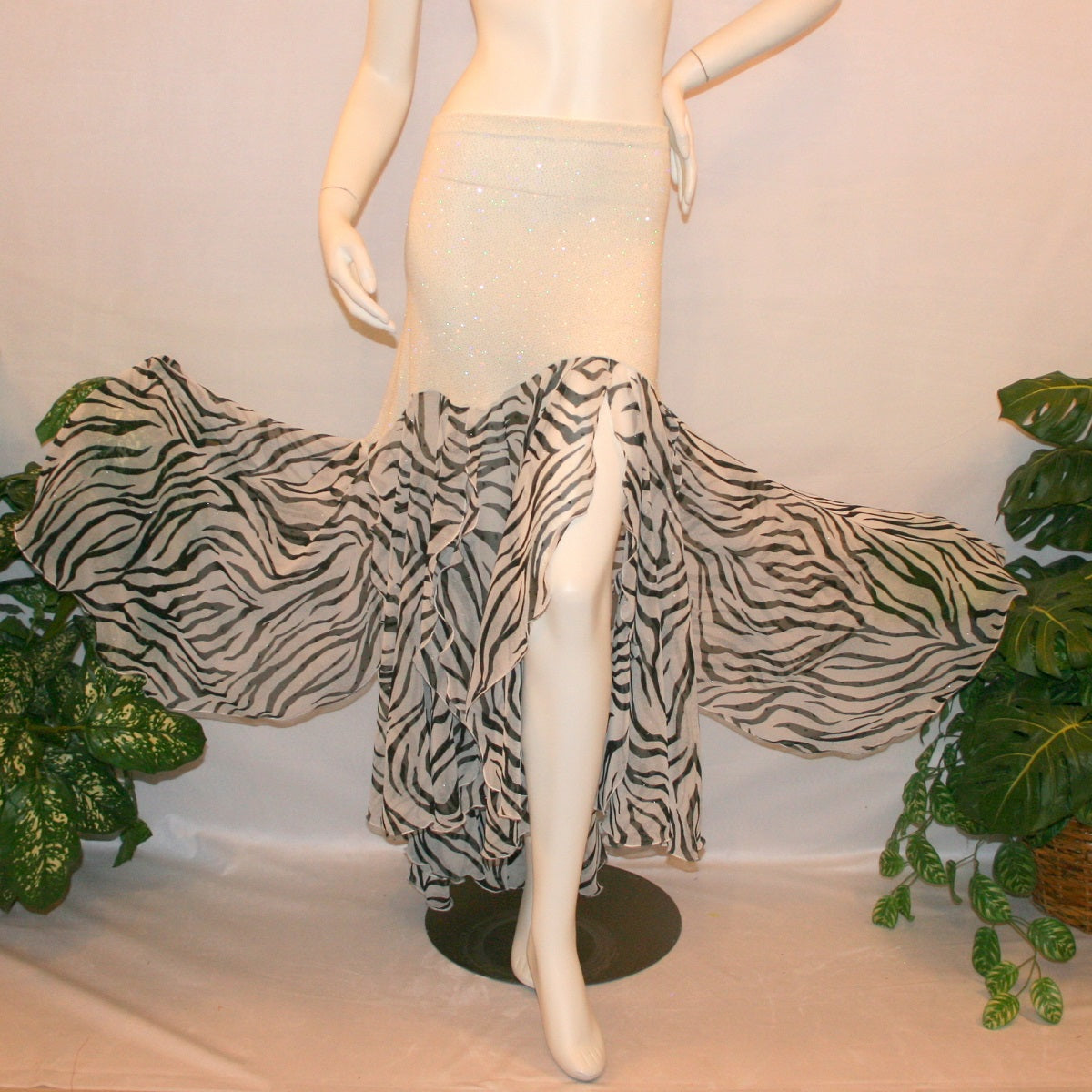 flaired view of Ballroom style skirt created of white glitter slinky with yards of zebra print flowing panels will work great to create a converta ballroom dress