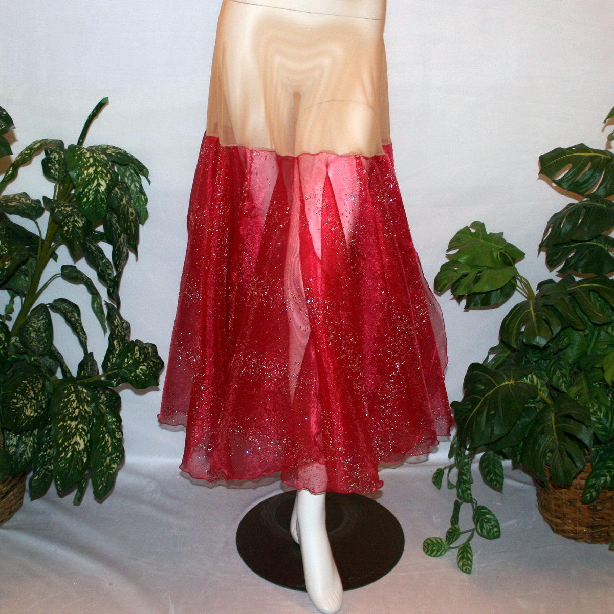 Red ballroom skirt created on a nude illusion hip band of yards of scarlette red panels with silver & pearlized flecking, very cool & showy!