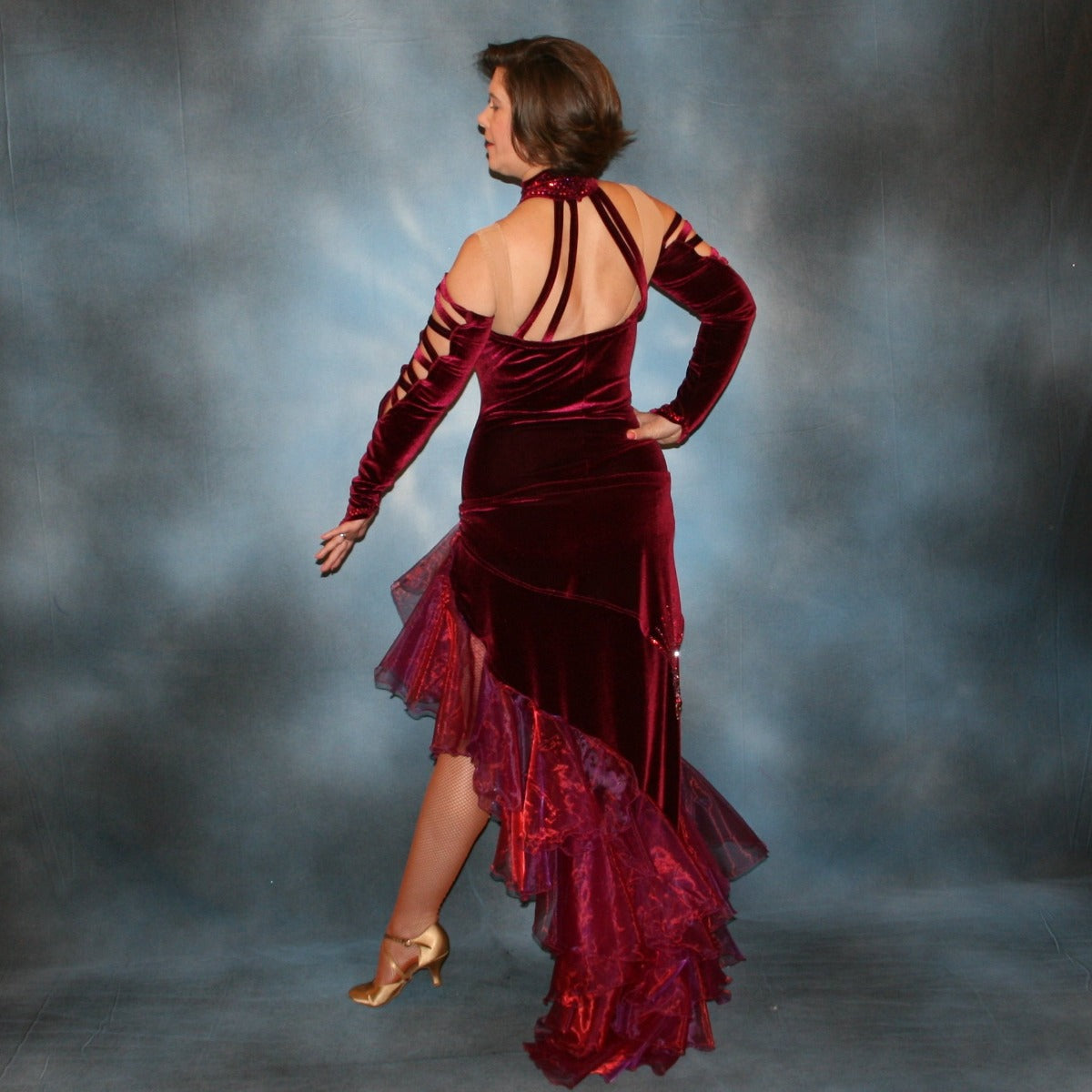 Crystal's Creations back view of Burgundy tango dress created in luxurious burgundy stretch velvet, with flounces of iridescent burgundy organza, adorned with fuchsia Swarovski rhinestones, hip sash has Swarovski hand beading as well, just recently embellished more.