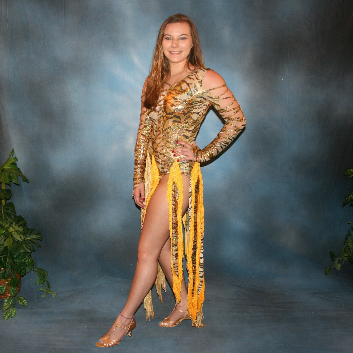 Crystal's Creations side view of gold hologram tiger print Latin/rhythm dress with fringe szie 5/6-9/10