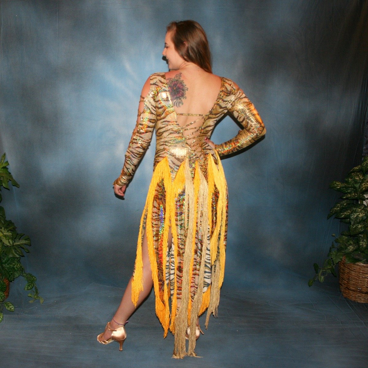 Crystal's Creations back view of gold hologram tiger print Latin/rhythm dress with fringe