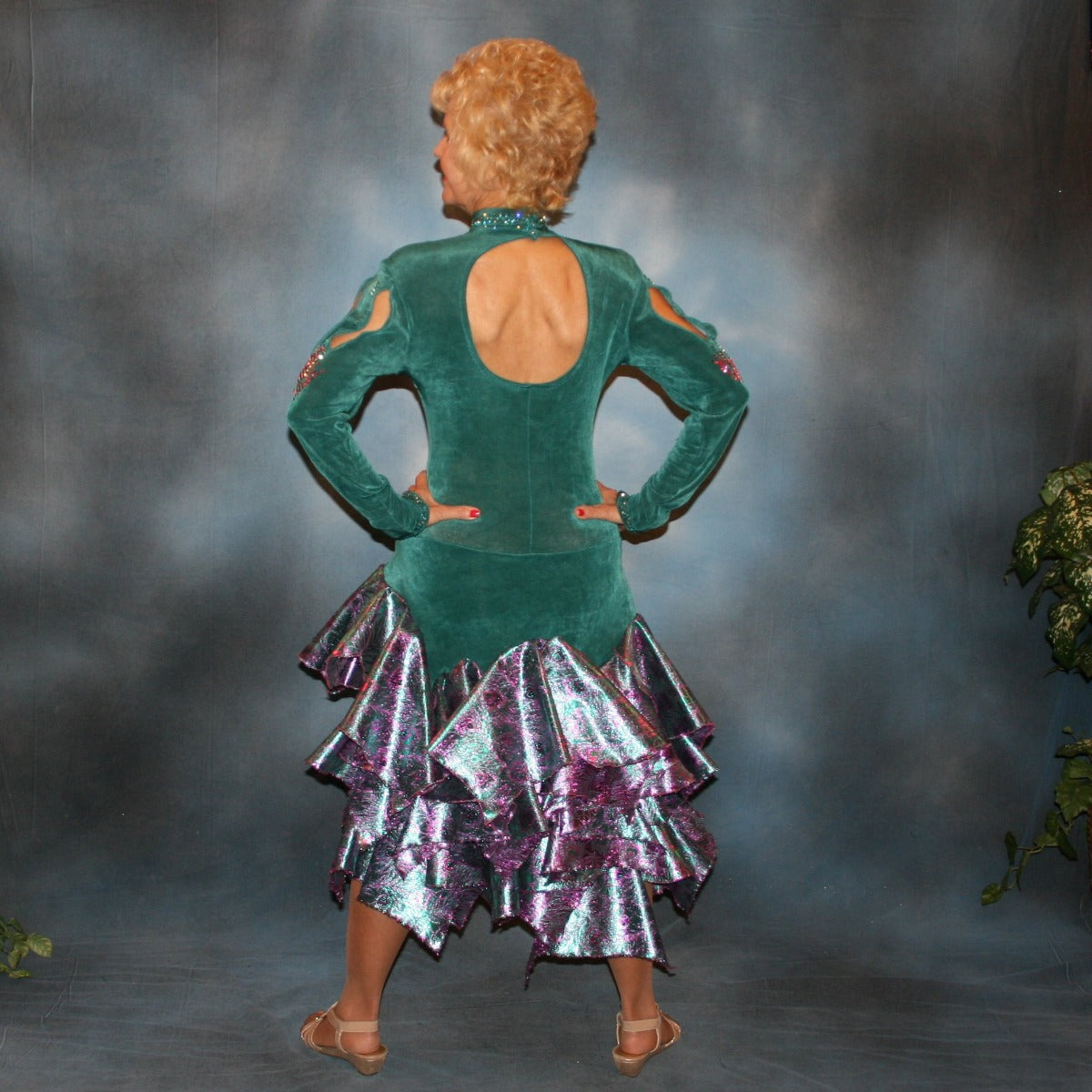 Crystal's Creations back view of Teal Latin/rhythm dress was created in luxurious teal solid slinky with teal & rose metallic brocade peacock print flounces, & embellished with fuchsia Swarovski rhinestone detailing
