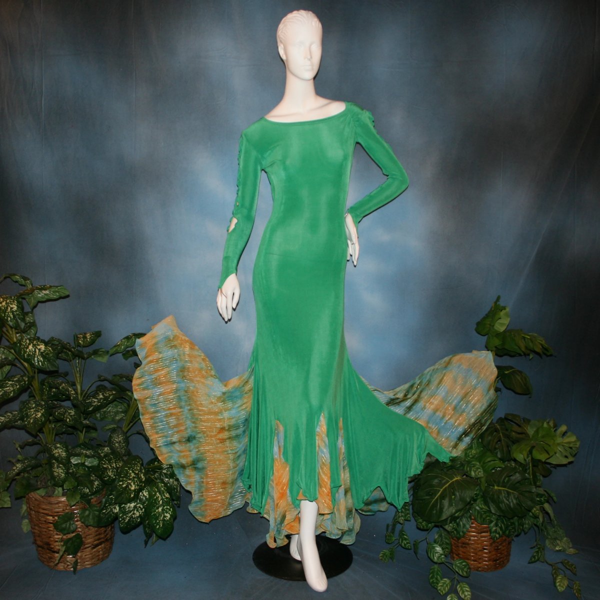 Gorgeous green ballroom dress created in luxurious solid slinky fabric with printed chiffon of greens, with gold accents insets. Very full around bottom...can be a beginner ballroom dancer smooth or standard dress.