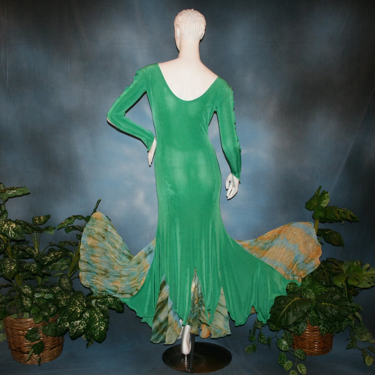 back view of Gorgeous green ballroom dress created in luxurious solid slinky fabric with printed chiffon of greens, with gold accents insets. Very full around bottom...can be a beginner ballroom dancer smooth or standard dress.