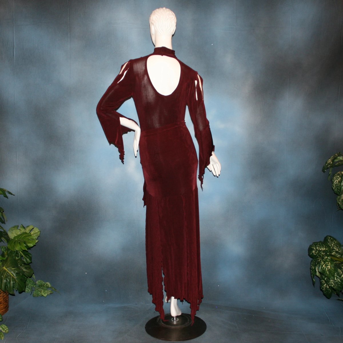 back view of Burgundy sarong style Latin/rhythm paneled skirt, matching bodysuit featuring flared arms with cutout details created of luxurious burgundy solid slinky. Great for any ballroom dance, ballroom dance teachers or social event!