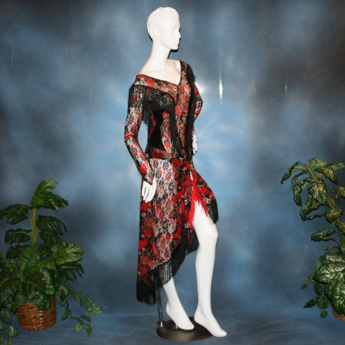 side view of Lace bodysuit & Latin/rhythm skirt created in red, black, and a touch of white stretch lace with chainette fringe trim. Fun dance set for any social ballroom dance, beginner ballroom showdance dress, or ballroom dance teachers!