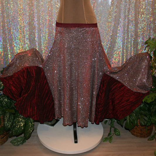 Ballroom dance skirt created of a very sparkly knit that shimmers silver & wine colors with insets of a 3 color pleated satin that looks wine colored with this particular fabric.