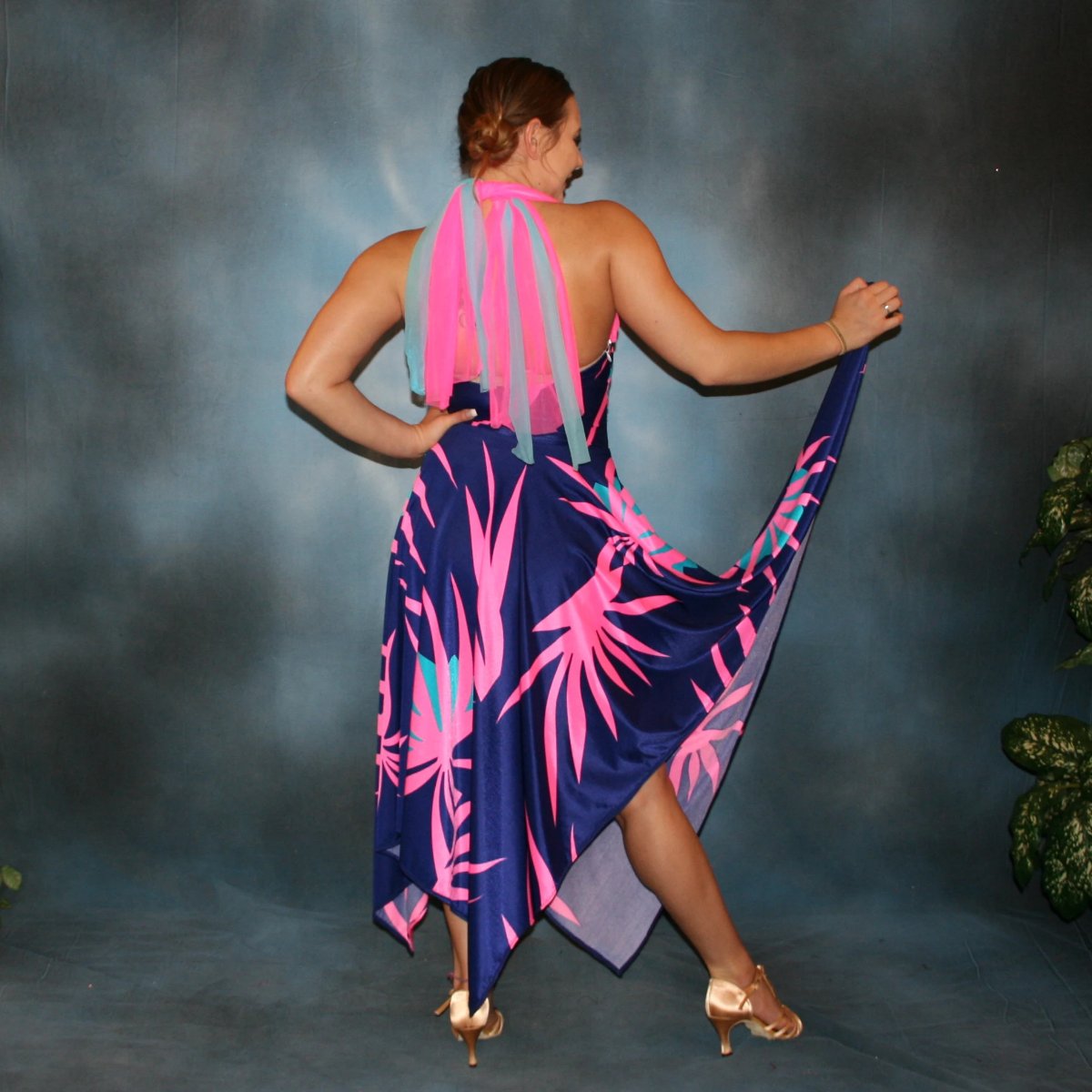 back view of Halter bodysuit with scarf detail & flair star shaped ballroom dance skirt created in deep blue print lycra with bubble gum pink & light blue starbursts, great for any ballroom dance, practice, ballroom teachers or social event!