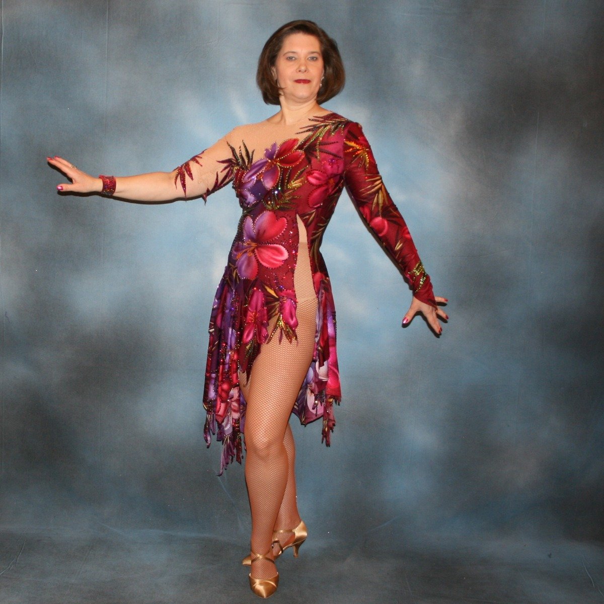 Crystal's Creations Tropical print Latin/rhythm dress created in tropical print lycra in burgundies & purples on a nude illusion base, embellished lavishly with Swarovski rhinestone work in burgundies, purples, orchids & a touch of the greens & golds tha