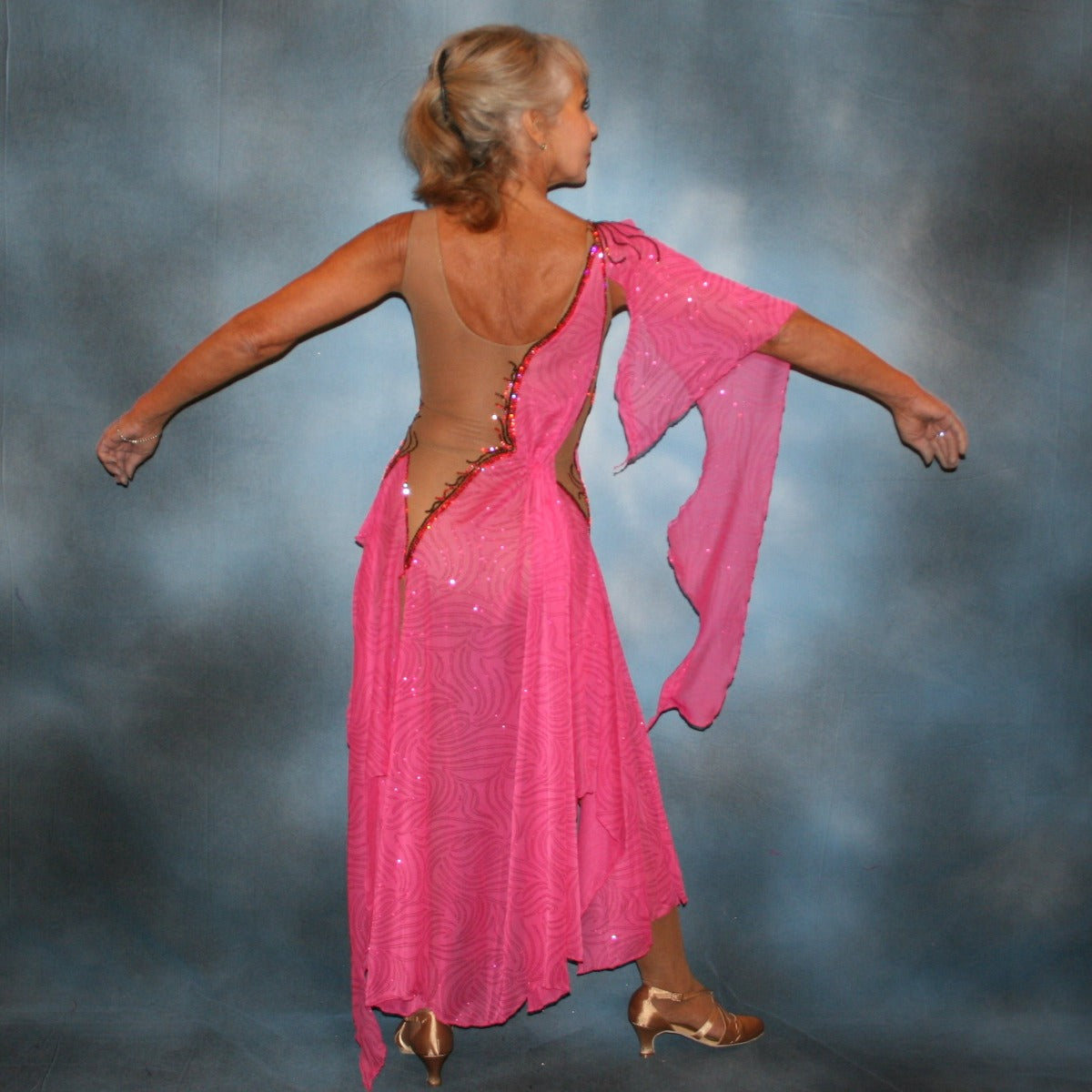 Crystal's Creations back view of Pink Latin/rhythm dress created of sheer swirls glitterknit on nude illusion base has the look of a Greek Goddess & is embellished with Swarovski stonework in Indian pink & bronze.