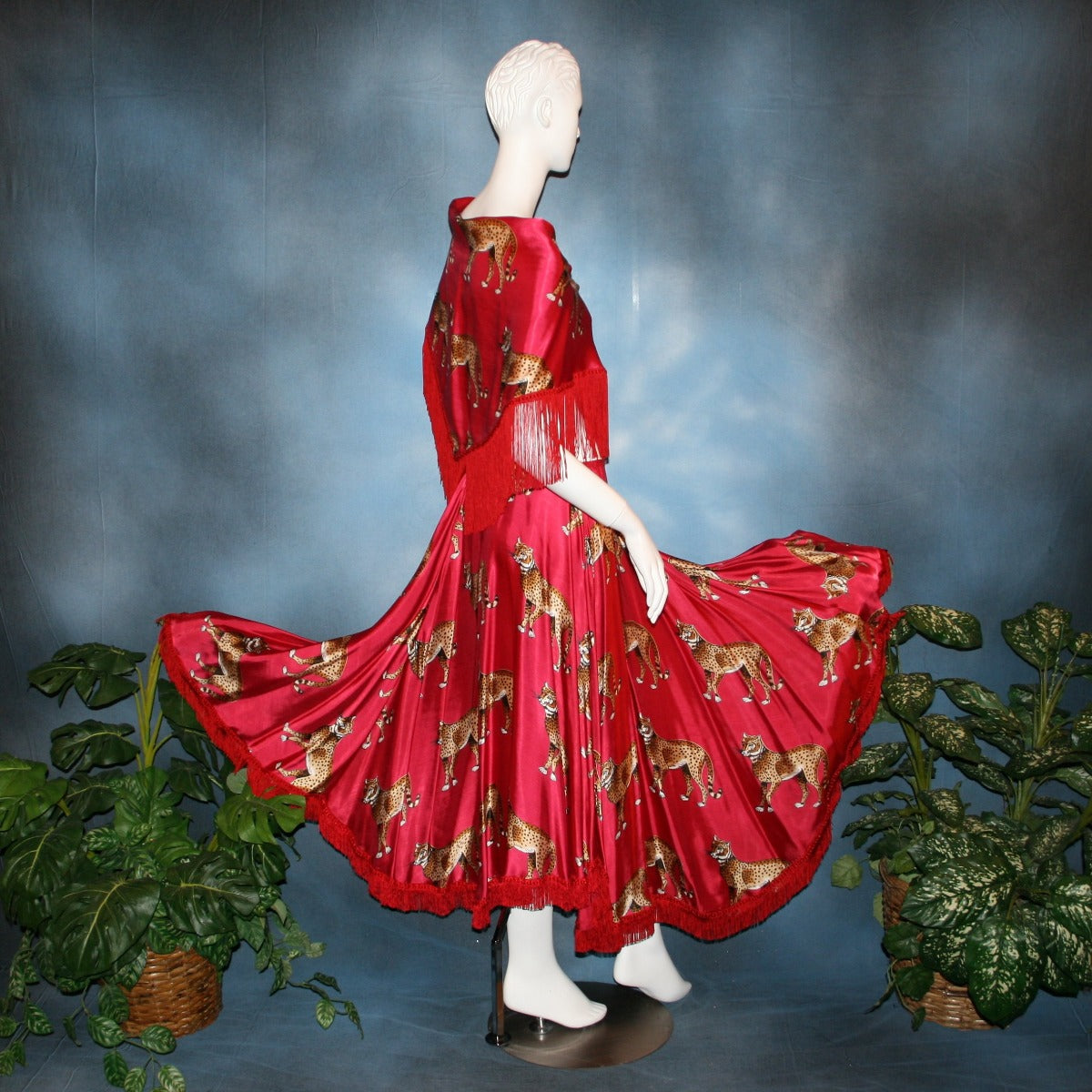 back side view of Red full circle ballroom skirt with chainette fringe was created of red satin with cheetah print along with matching shawl to team with a bodysuit or top. I can envision custom creating a body suit of cheetah fabric to team with this...actually would be fun to create a few to mix & match with this ballroom skirt set...some with Swarovski work!!