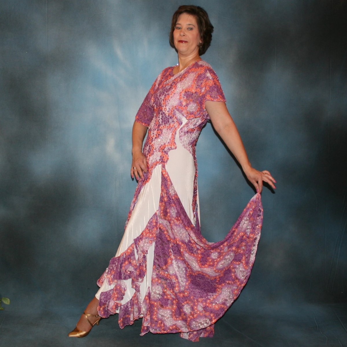 Crystal's Creations left side view of White ballroom dress with a romantic country dance flair created on a luxurious white stretch velvet base, deep orchid and peach flowered stretch lace insets, flounces and bodice overlays embellished with Swarovski rhinestone work, hand beading