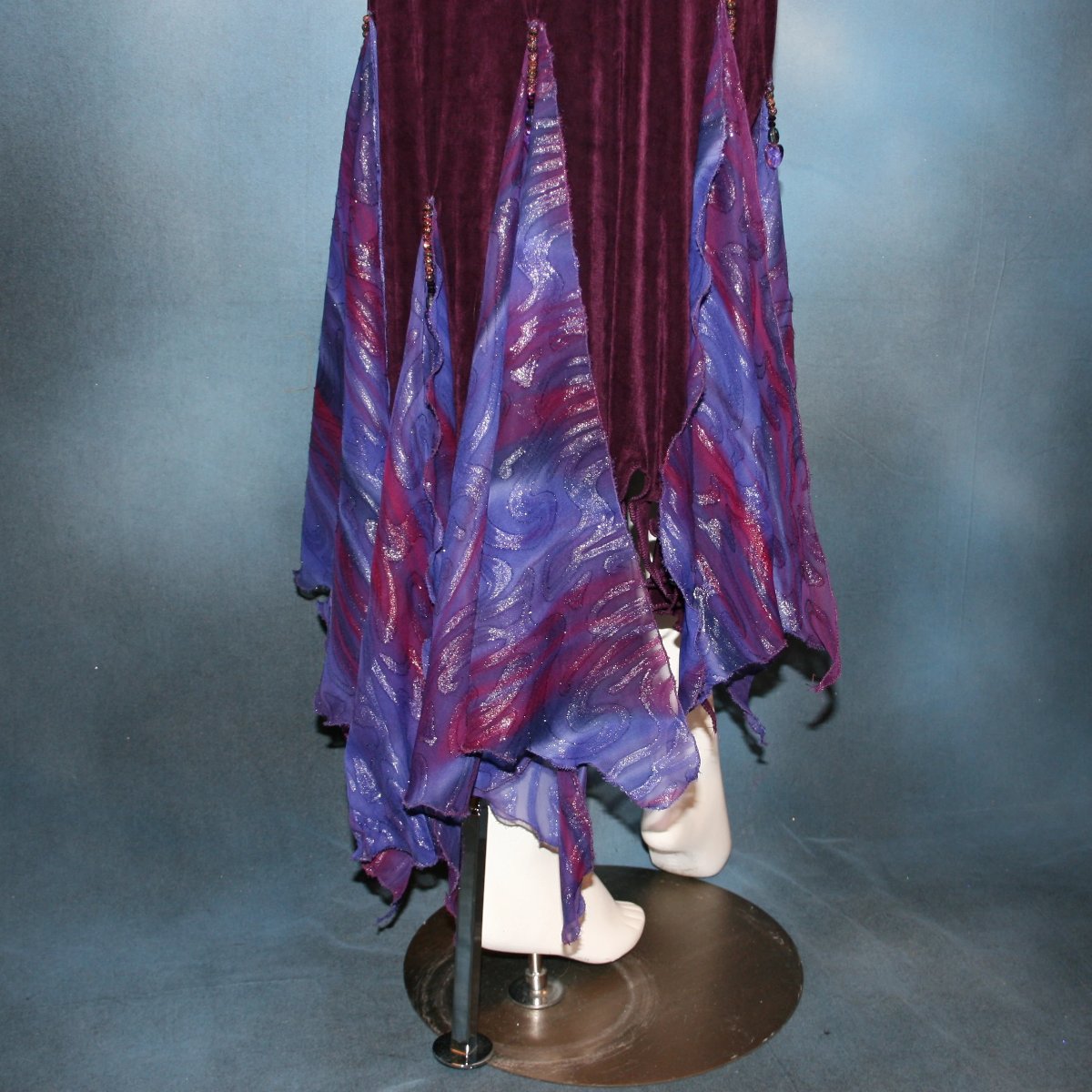 lower view of Social ballroom dance dress created in luxurious wine solid slinky fabric with flounces of deep scarlette & wine printed & dazzling chiffon, with Swarovski hand beading. A great social dress for any ballroom dance or special occasion, as well as a great beginner ballroom dance show dress!  