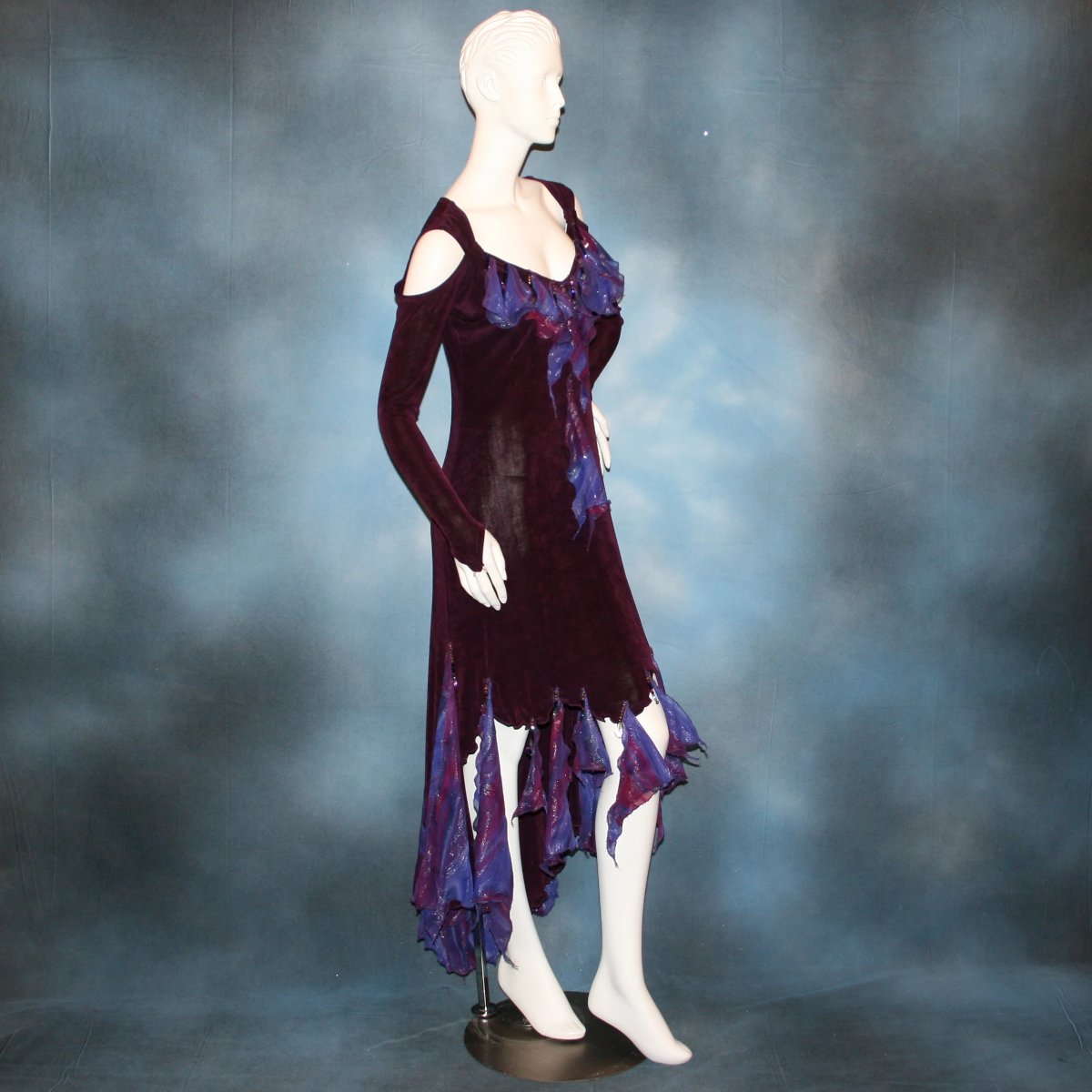 side view of Social ballroom dance dress created in luxurious wine solid slinky fabric with flounces of deep scarlette & wine printed & dazzling chiffon, with Swarovski hand beading. A great social dress for any ballroom dance or special occasion, as well as a great beginner ballroom dance show dress!  