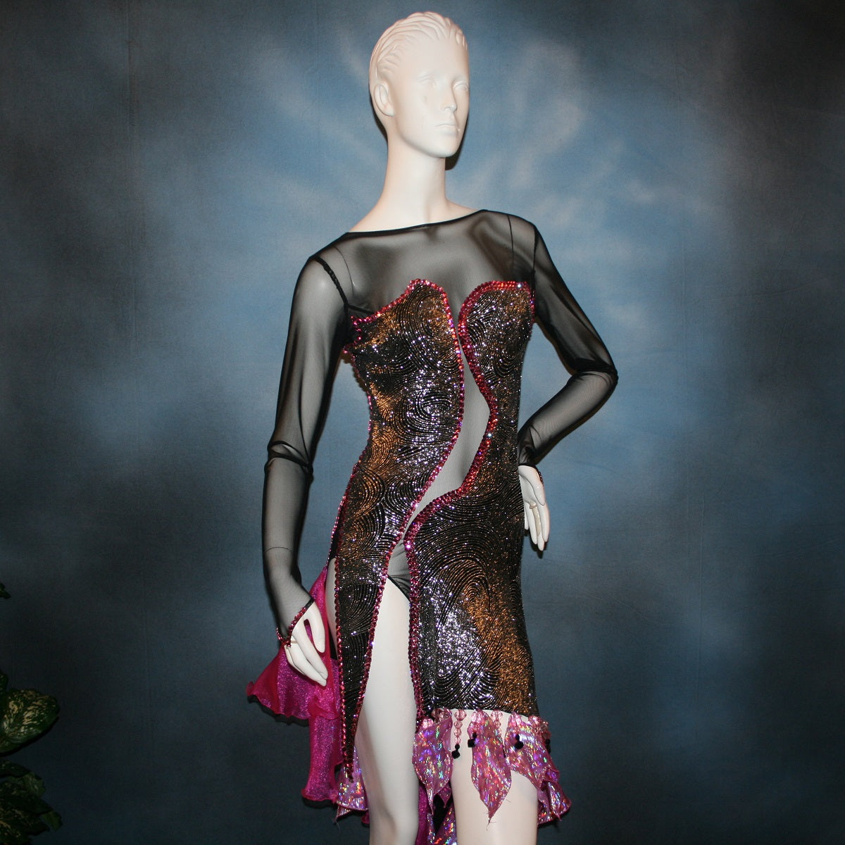 Crystal's Creations close up view of Black & silver Latin/rhythm dress with pink accents created of gorgeous silver swirls on black glitter slinky on a sheer stretch mesh base, embellished with pink Swarovski rhinestone work & hand beading