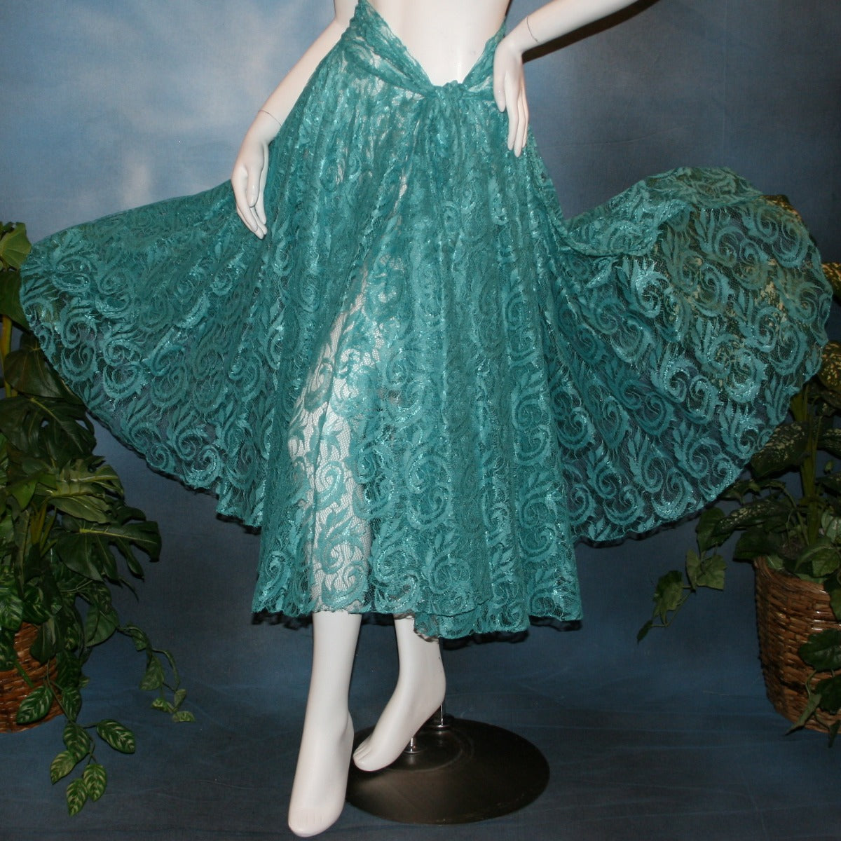 Crystal's Creations Aqua lace ballroom skirt, wrap style, was created with yards of aqua lace, many panels shaped like large petals.